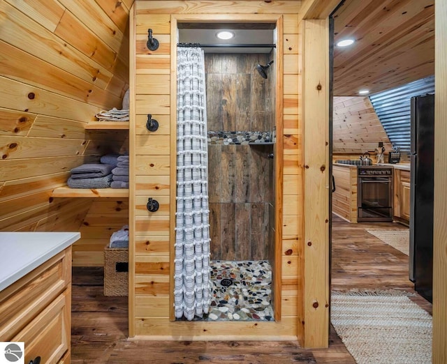 1428 Morel Ln, Grayling, MI 49738 - relaxing sauna / steam room with wood-type flooring and wooden walls