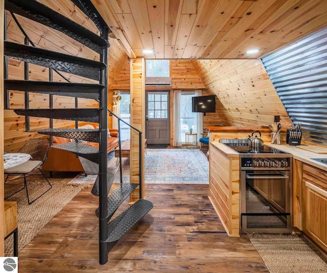 1428 Morel Ln, Grayling, MI 49738 - kitchen featuring stainless steel electric range oven, wooden ceiling, dark wood finished floors, and wooden walls