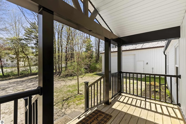 wooden terrace with an outdoor structure
