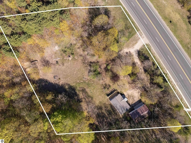 aerial view of property and surrounding area with property boundaries highlighted