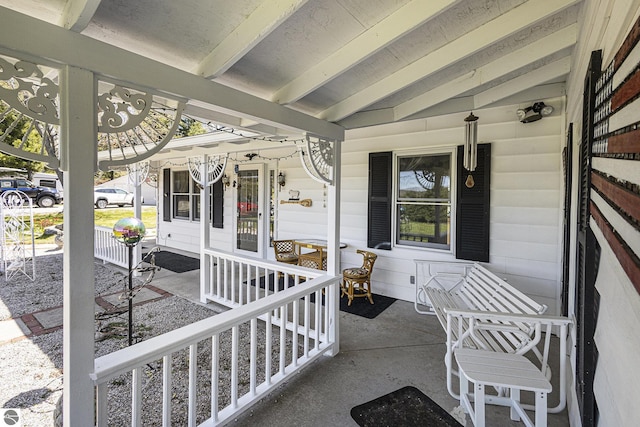 3121 Grace Rd, Frankfort, MI 49635 - view of patio / terrace with a porch
