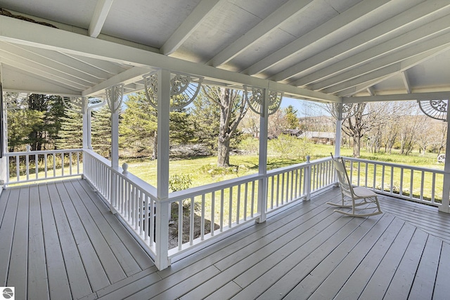 3121 Grace Rd, Frankfort, MI 49635 - deck featuring a lawn and a porch