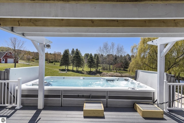 3121 Grace Rd, Frankfort, MI 49635 - wooden deck with a hot tub