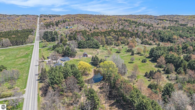 3121 Grace Rd, Frankfort, MI 49635 - aerial view of property's location featuring a heavily wooded area