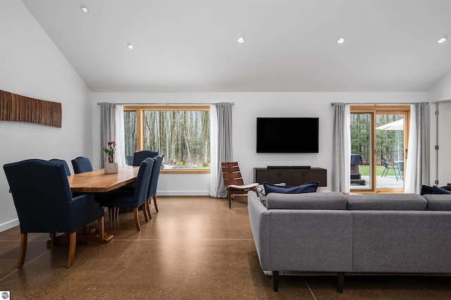 20651 E Trails End Trl, Interlochen, MI 49643 - living area featuring lofted ceiling, plenty of natural light, baseboards, speckle patterned floor, and recessed lighting