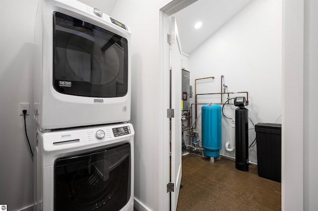 20651 E Trails End Trl, Interlochen, MI 49643 - washroom with stacked washing machine and dryer and recessed lighting