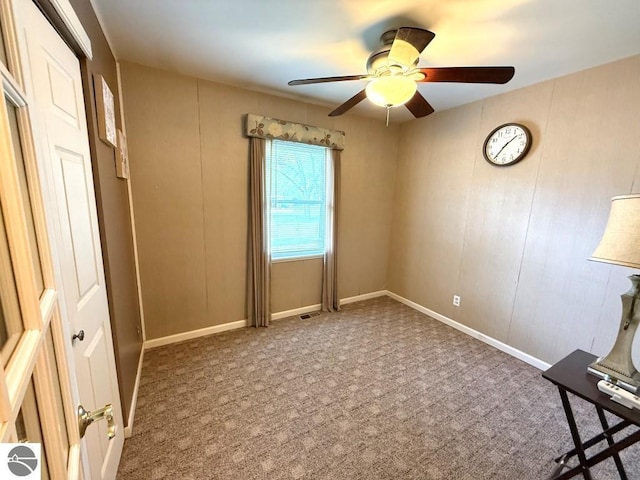 1411 N Dr, Mount Pleasant, MI 48858 - unfurnished room featuring a ceiling fan and carpet floors