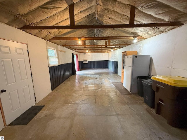 1411 N Dr, Mount Pleasant, MI 48858 - hall featuring lofted ceiling and concrete floors