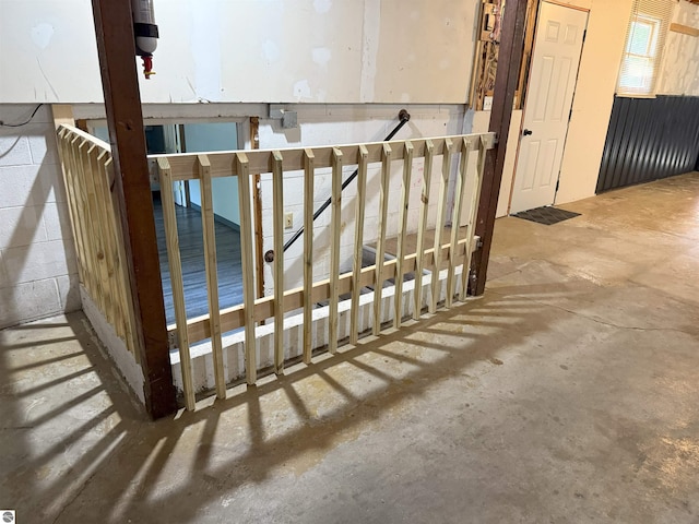 1411 N Dr, Mount Pleasant, MI 48858 - stairs with concrete flooring
