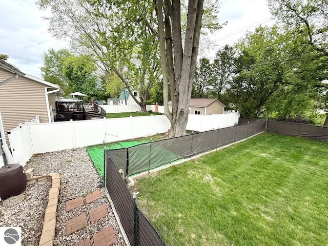1411 N Dr, Mount Pleasant, MI 48858 - view of yard featuring a wooden deck
