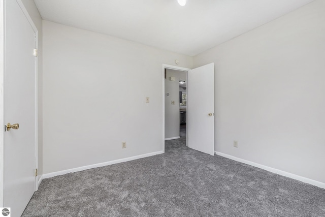 7401 Red Maple Dr, Cadillac, MI 49601 - unfurnished room with carpet and baseboards