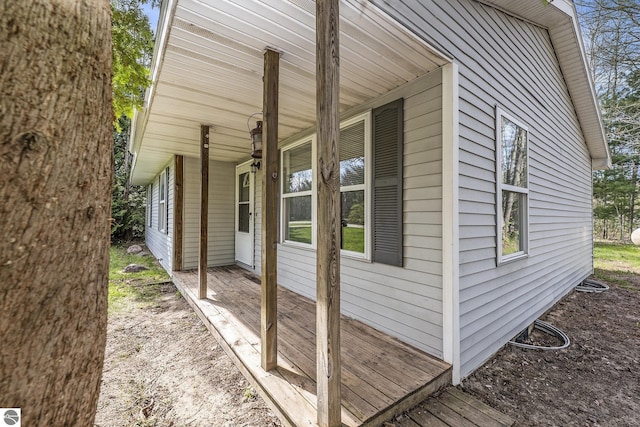 7401 Red Maple Dr, Cadillac, MI 49601 - view of home's exterior featuring a porch