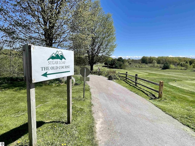 UNIT15 S Club Dr Unit 15, Cedar, MI 49621 - view of road with traffic signs and a view of rural / pastoral area
