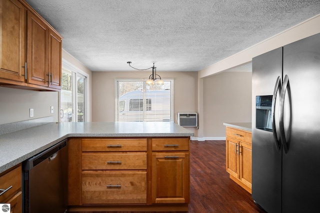 9869 E Cherry Bend Rd, Traverse City, MI 49684 - kitchen featuring appliances with stainless steel finishes, a peninsula, brown cabinets, dark wood-type flooring, and light countertops