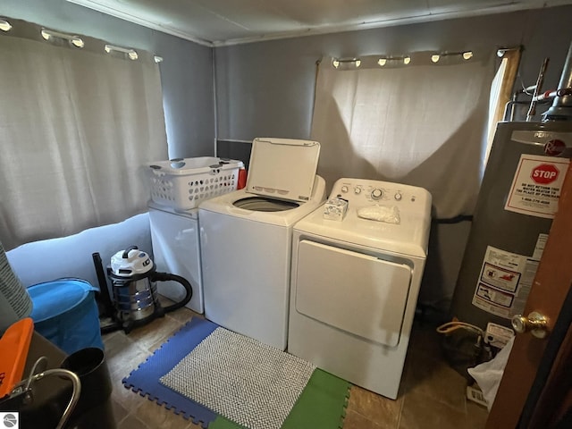 2214 Karen Dr, Saint Helen, MI 48656 - laundry room with water heater and separate washer and dryer