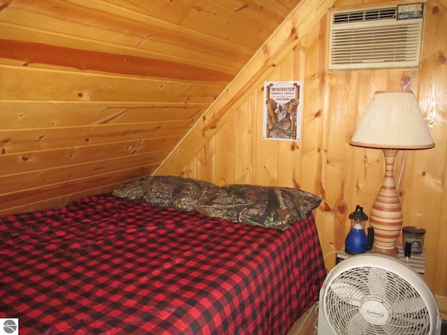 00 S 47 3/4 Rd, Cadillac, MI 49601 - bedroom featuring vaulted ceiling, wood ceiling, an AC wall unit, and wood walls