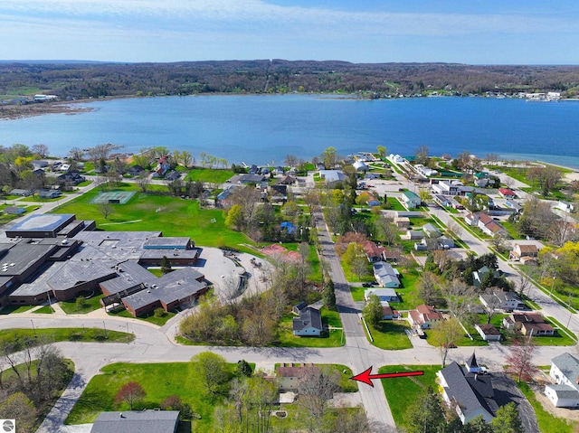 8377 Zosel St, Onekama, MI 49675 - aerial overview of property's location featuring nearby suburban area and a large body of water
