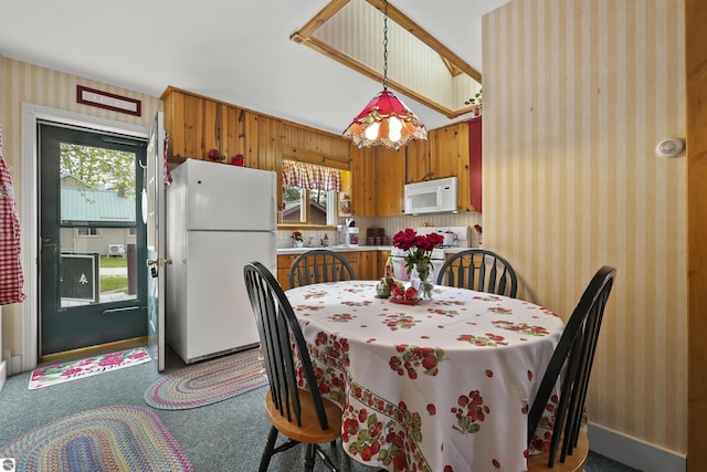 66 N Center St, Lake City, MI 49651 - carpeted dining area with wallpapered walls
