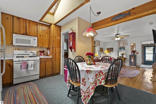 66 N Center St, Lake City, MI 49651 - dining room featuring a ceiling fan and wood finished floors