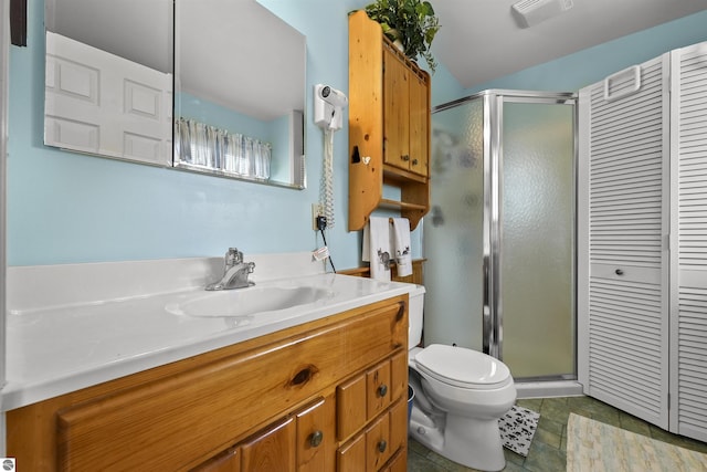 66 N Center St, Lake City, MI 49651 - bathroom with a stall shower, toilet, vanity, and a closet