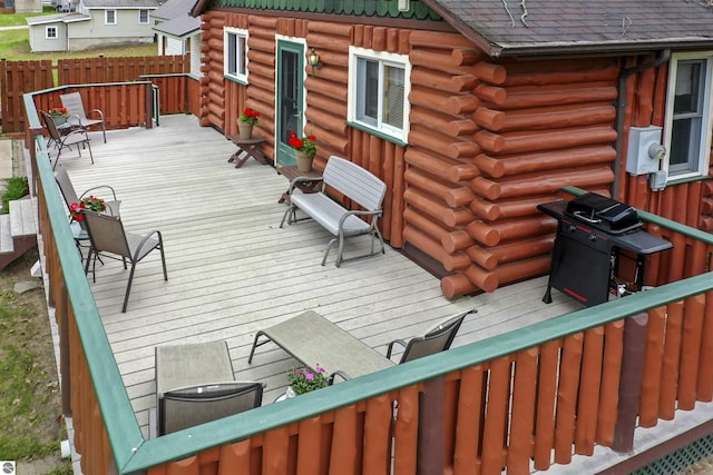 66 N Center St, Lake City, MI 49651 - wooden terrace featuring fence