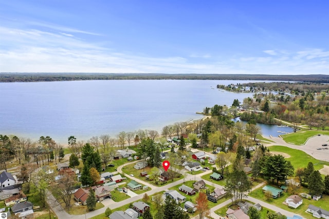 66 N Center St, Lake City, MI 49651 - aerial view of property's location featuring nearby suburban area and a large body of water