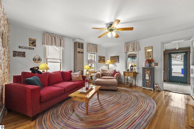 66 N Center St, Lake City, MI 49651 - living area featuring wood-type flooring, healthy amount of natural light, and ceiling fan