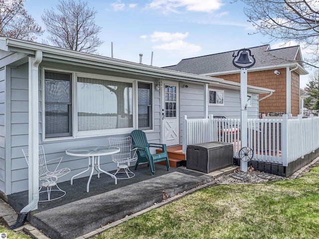 8805 Iroquois Trl, Saint Helen, MI 48656 - back of property with a deck