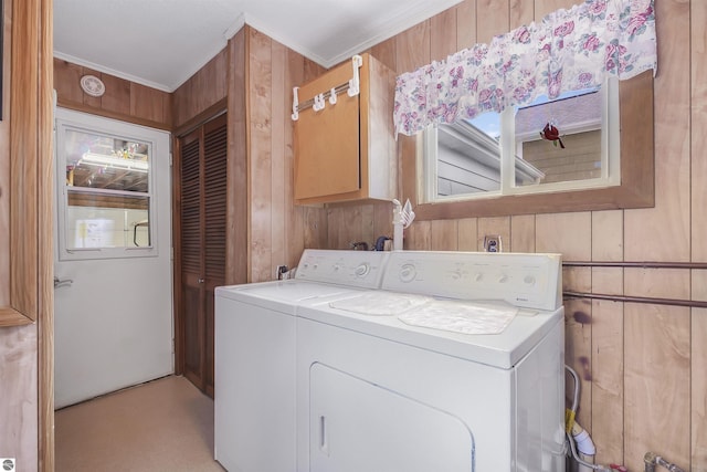 8805 Iroquois Trl, Saint Helen, MI 48656 - washroom featuring wood walls, washing machine and clothes dryer, and crown molding