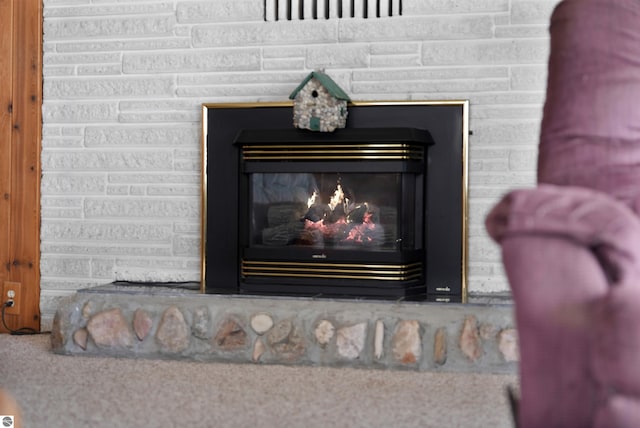 8805 Iroquois Trl, Saint Helen, MI 48656 - detailed view of a glass covered fireplace