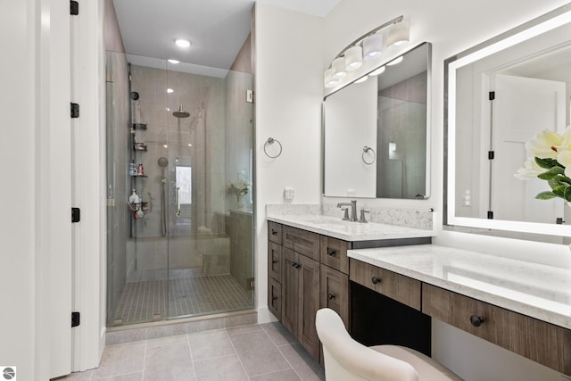 3046 E Greenwood Rd, Lake Leelanau, MI 49653 - full bath featuring a shower stall, vanity, tile patterned flooring, and recessed lighting