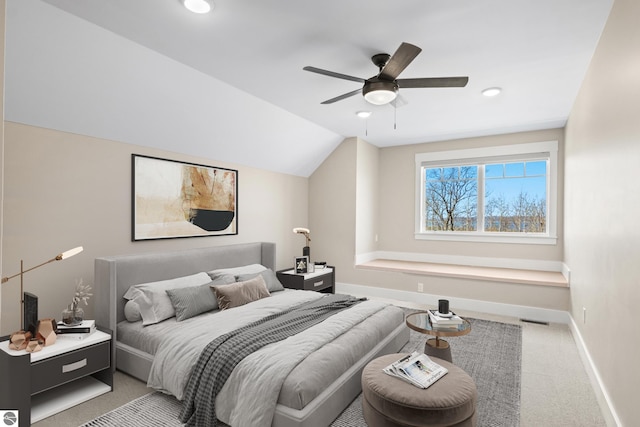 3046 E Greenwood Rd, Lake Leelanau, MI 49653 - bedroom featuring baseboards, light carpet, vaulted ceiling, recessed lighting, and ceiling fan