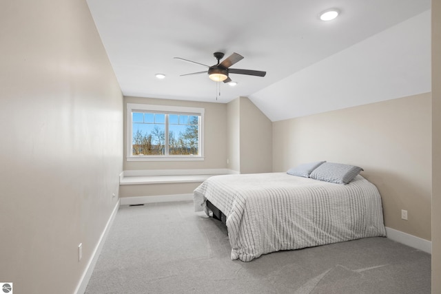 3046 E Greenwood Rd, Lake Leelanau, MI 49653 - carpeted bedroom with baseboards, lofted ceiling, a ceiling fan, and recessed lighting