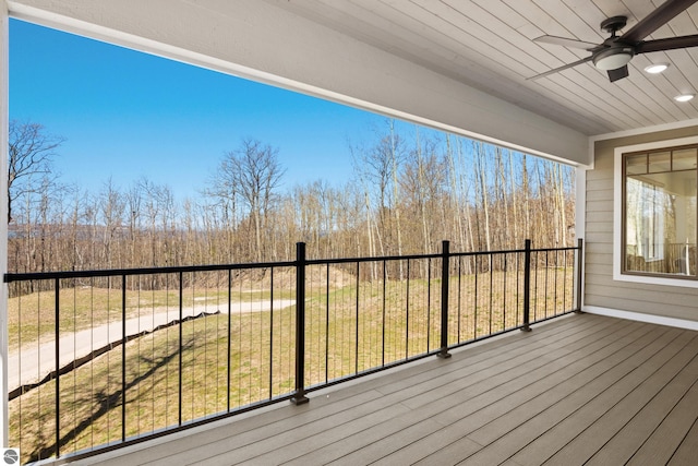 3046 E Greenwood Rd, Lake Leelanau, MI 49653 - deck featuring a ceiling fan