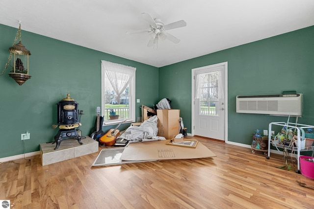 512 NW Kalkaska St, Kalkaska, MI 49646 - recreation room with plenty of natural light, wood finished floors, and ceiling fan