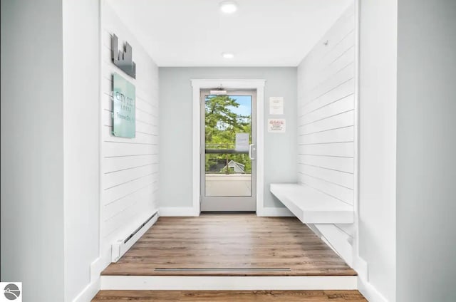 914 E Front St Unit 16, Traverse City, MI 49686 - mudroom featuring a baseboard heating unit, wood finished floors, baseboards, and recessed lighting