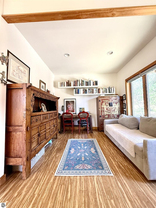 sitting room featuring wood finished floors, recessed lighting, and a desk