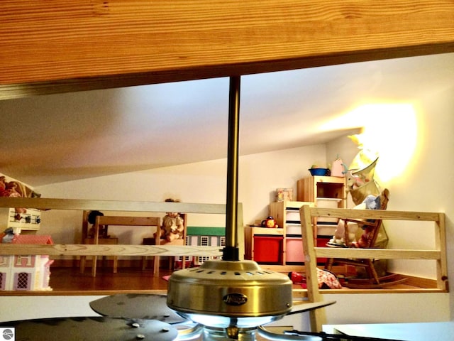 living area featuring vaulted ceiling