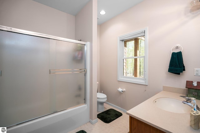 4854 Forest Trl, Bellaire, MI 49615 - bathroom with toilet, baseboards, vanity, shower / bath combination with glass door, and recessed lighting