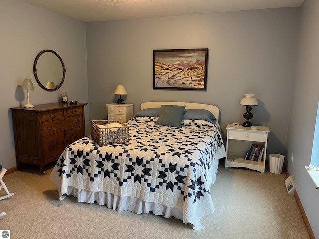 6557 Betsie River Rd, Interlochen, MI 49643 - carpeted bedroom featuring baseboards
