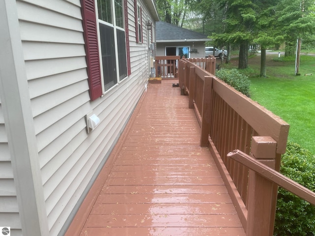 6557 Betsie River Rd, Interlochen, MI 49643 - wooden terrace with a lawn