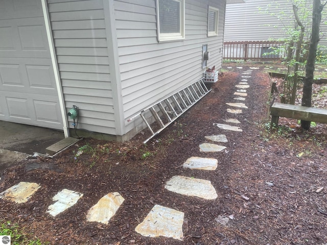 6557 Betsie River Rd, Interlochen, MI 49643 - view of yard with central AC unit