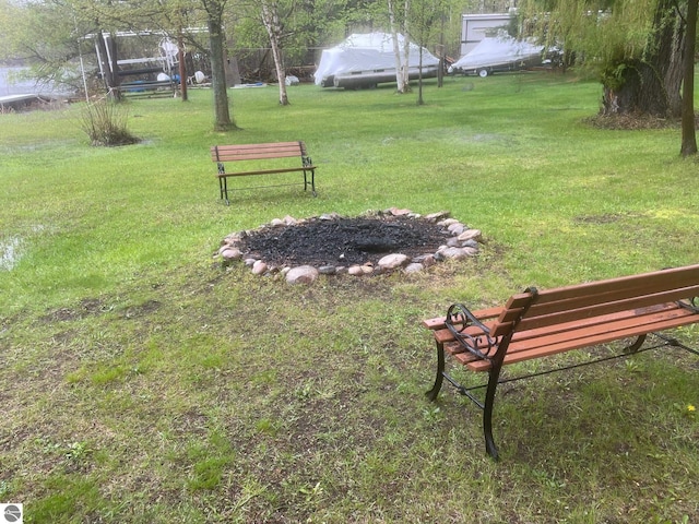 6557 Betsie River Rd, Interlochen, MI 49643 - view of home's community with a yard