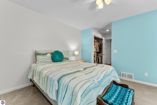 4306 Central Park Dr, Grawn, MI 49637 - bedroom with carpet floors, baseboards, and a walk in closet
