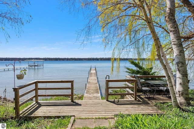 4306 Central Park Dr, Grawn, MI 49637 - dock featuring a water view