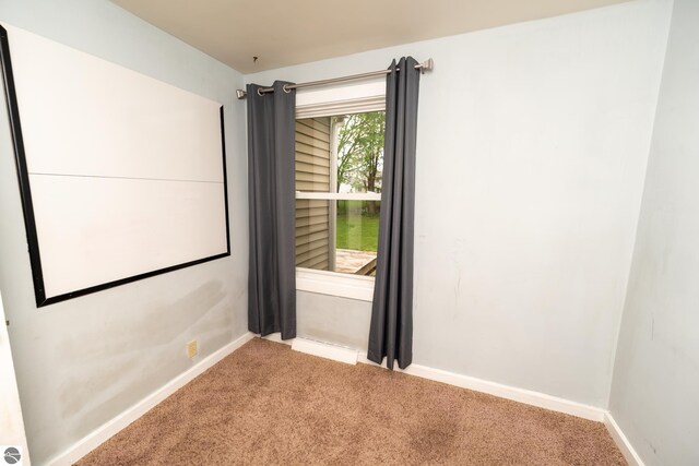 1618 E High, Mount Pleasant, MI 48858 - carpeted empty room with baseboards