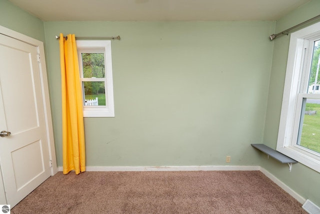 1618 E High, Mount Pleasant, MI 48858 - carpeted spare room featuring baseboards