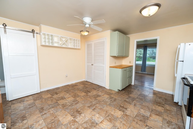 1618 E High, Mount Pleasant, MI 48858 - kitchen with green cabinets, electric range, stone finish floors, wood counters, and a ceiling fan