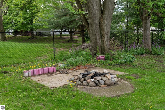 1618 E High, Mount Pleasant, MI 48858 - view of yard with a fire pit