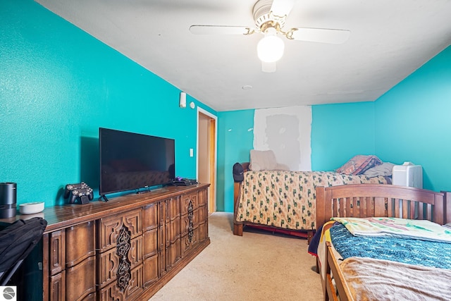 505 S Cherry St, Kalkaska, MI 49646 - carpeted bedroom featuring ceiling fan